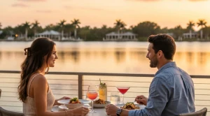 A couple having dinner with an lake view.