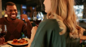 A couple is enjoying dinner at a restaurant.